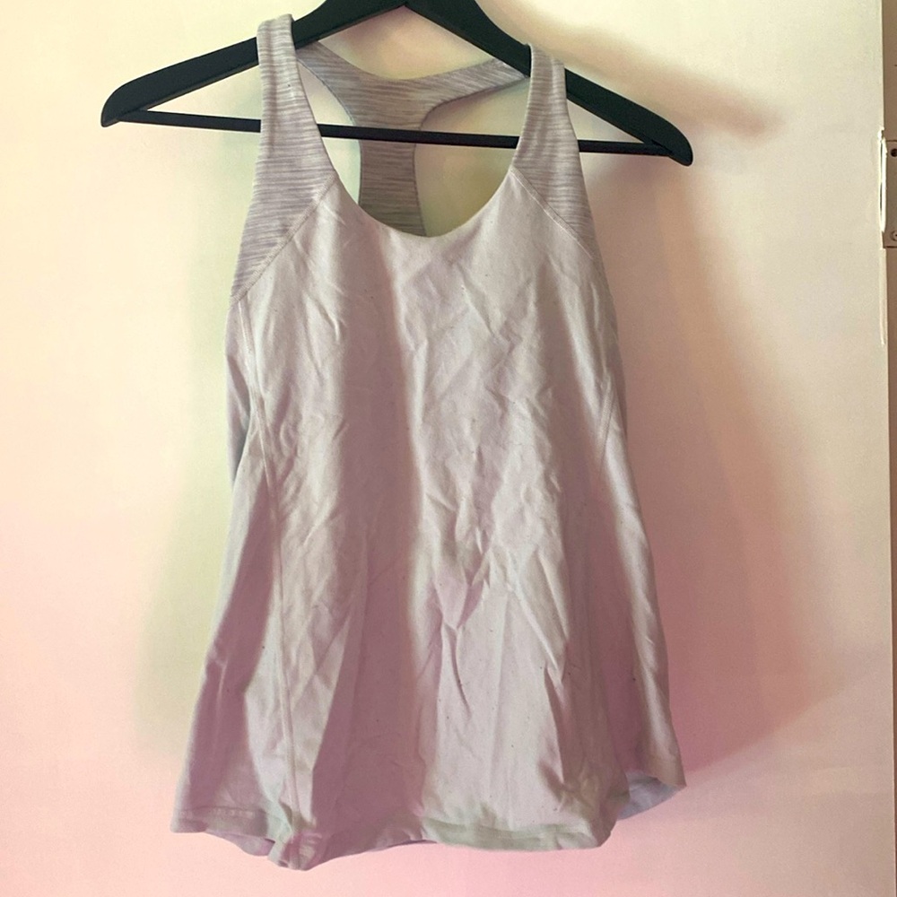 White Lululemon tank top with adjustable built in bra